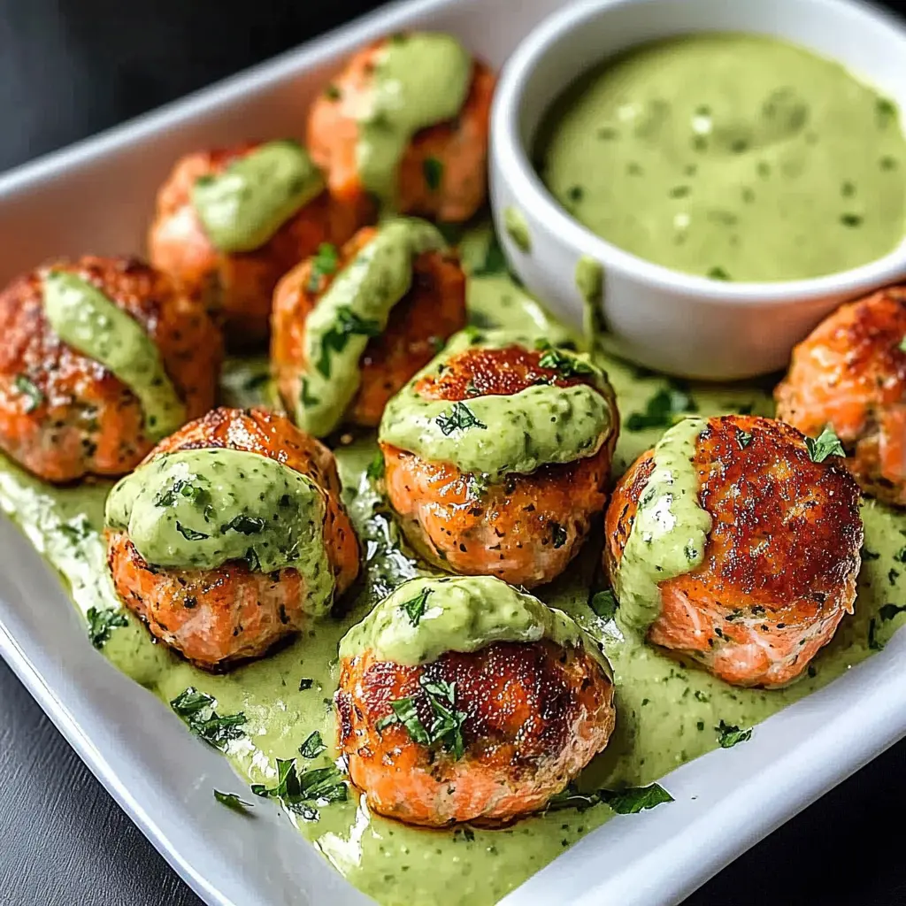 These Baked Salmon Meatballs are a simple and healthy dinner option! Packed with flavor and served with a tangy avocado sauce, they’re perfect for any weeknight meal or weekend gathering. The combination of tender salmon and creamy avocado is sure to impress. Save this recipe for a nutritious feast that your loved ones will ask for again and again!