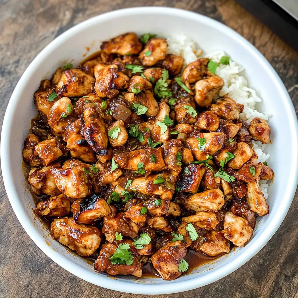 Enjoy a quick and delicious homemade version of your favorite Chipotle Chicken! This recipe is packed with bold flavors from marinated chicken thighs, smoked paprika, and lime juice. Perfect for burritos, tacos, or salads. Save this pin for your next meal prep or casual gathering and impress your family with this tasty dish!