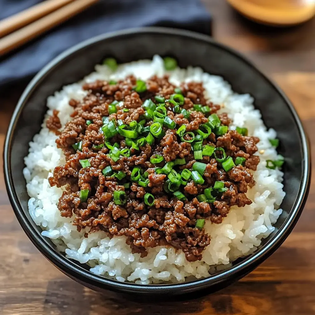 Get ready for a delicious Korean Ground Beef Bowl that's packed with flavor! This easy-to-make dish features seasoned ground beef, fresh veggies, and a savory sauce that brings everything together. Perfect for weeknight dinners or meal prep, this recipe is a crowd-pleaser. Save this pin and enjoy a taste of Korea anytime!